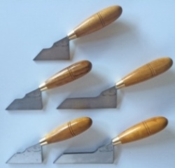 Assorted pointing tools wooden handles and varying blade shapes