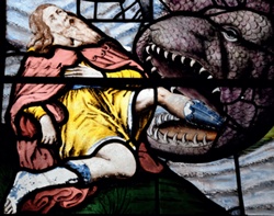 Jonah being devoured by a distinctly snake-like 'whale'