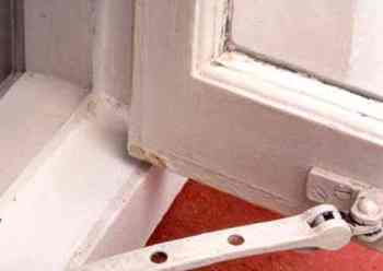 casement window with cracked paintwork