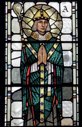 St Aidan with mitre and crosier, hands clasped in prayer