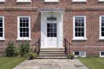 Conservatin front door with sash windows