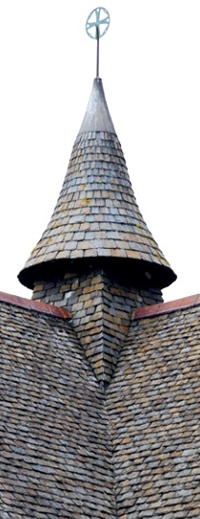 Welsh slate roof with conical slated fleche at roof junction
