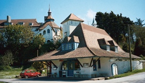 Elements of Coates Carter's Arts & Crafts monastery and community buildings at Caldey Island