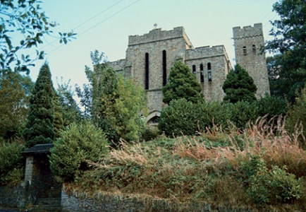 The towering facade of the derelict church of St Luke, Abercarn