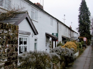 Row of terraced houses some with uPVC windows