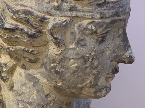 Sculpture damaged by shotgun pellets