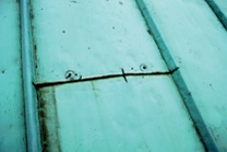 Crack to edge of copper sheet on pitched roof