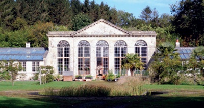 The neoclassical facade of the camellia house at New Wardour