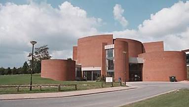 The red-brick cylindrical forms of Spence's Gardner Arts Centre