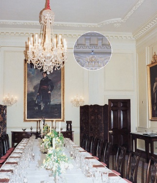 Historic house interior with sprinkler location circled and magnified