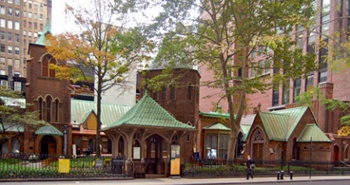 The Church of the Transfiguration, which is set back from the street behind its popular garden