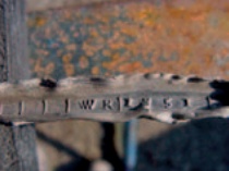 Close-up photo showing 18th-century markings on original window lead