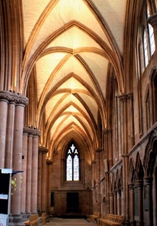 LED lighting floods the vaulted aisle ceiling