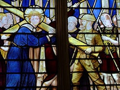 Soldiers from various historical periods aid Christ bearing the cross