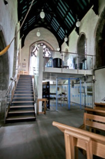 Two-level heritage centre conversion to north transept of St Michael and All Angels