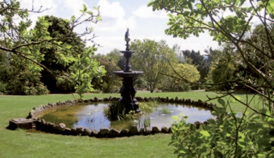 Late Victorian fountain and stone-edged pond at Morrab Gardens, Penzance