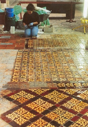 Conservator restoring tiles at Winchester Cathedral