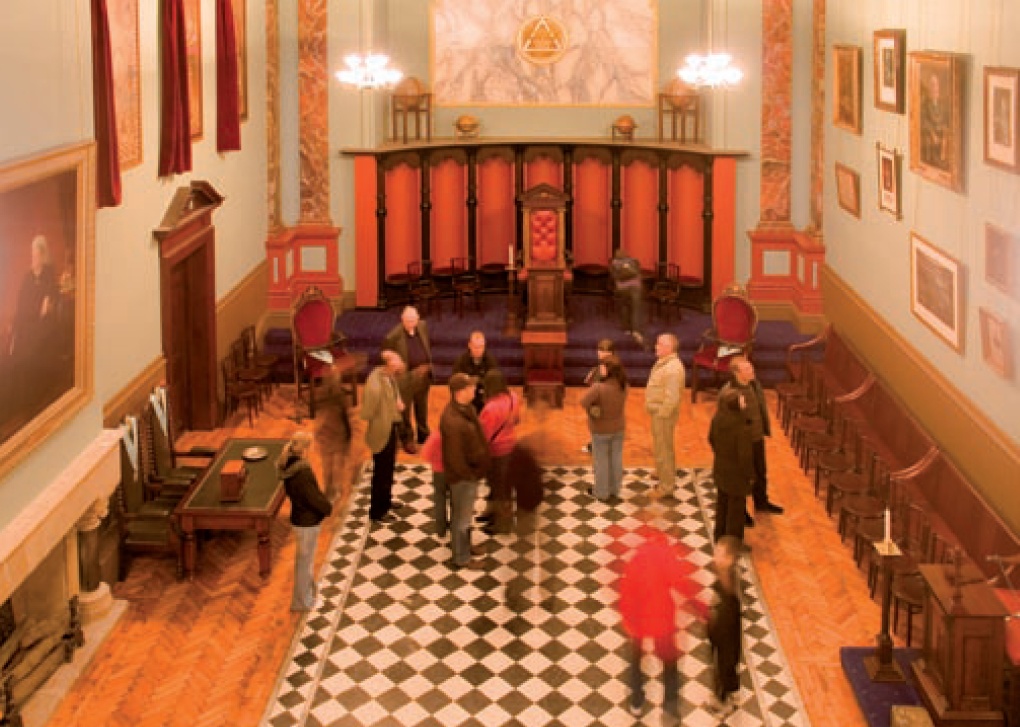 Visitors inspect the lodge room