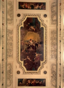 Ceiling paintings with intricate plasterwork surrounds
