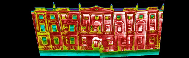 Thermal image showing heat loss from the windows, roof and facade of a historic building