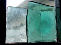 Clear and coloured pieces of slab glass