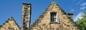 Crow-step masonry gables and chimney stack