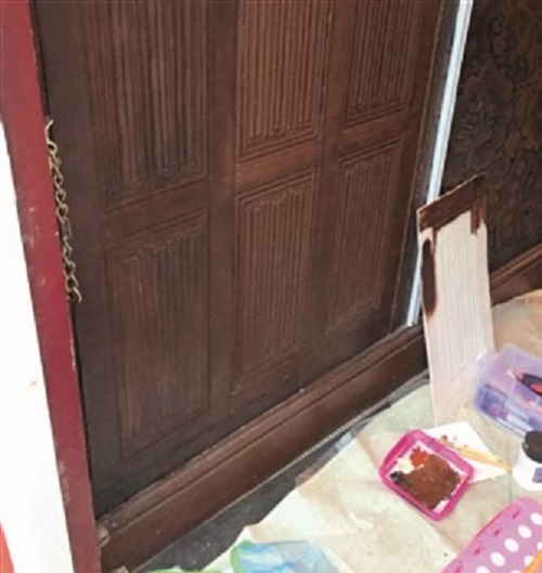 Replacement panel being fitted and painted