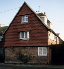 The same gable shown in the title illustration refurbished with replacement tiles