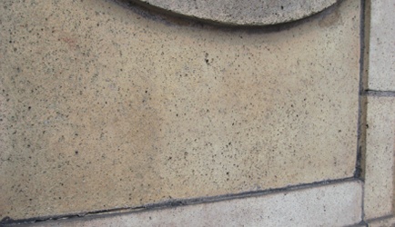 Close-up showing the surface pitting caused by sandblasting