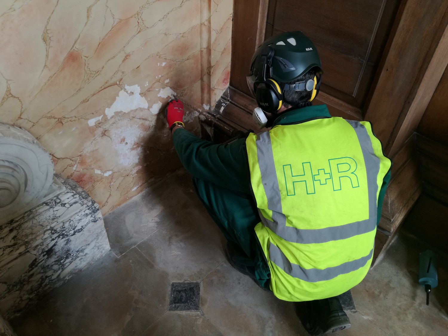 A surveyor undertaking gravimetric sampling