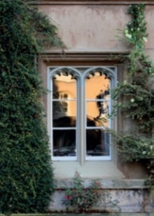 Window with frame and surround elements painted white