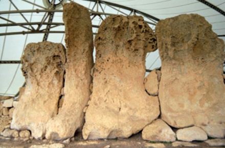 The ruins of Hagar Qim, Malta, covered by a protective, steel-framed canopy