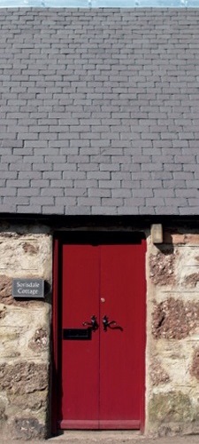 New slate roof on a stone cottage