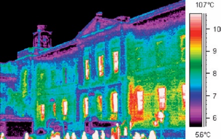 Image produced by thermal imaging camera showing heat loss from windows in a historic facade