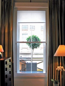 Secondary glazed window in a smart hotel room