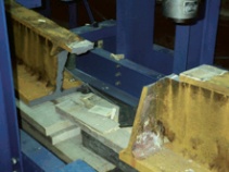 Fractured cast iron beam in test lab