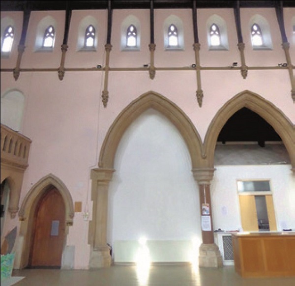 Internal archway with infil removed to accommodate new toilets.