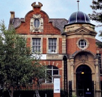 The Edwardian free-style facade of Crofton Park Library, with imposing Dutch gable and domed octagonal tower