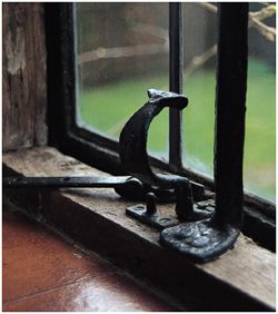 An iron stanchion with an expanded foot.